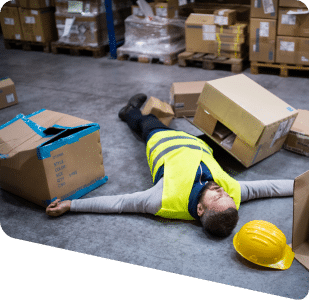 warehouse worker looking overwhelmed with boxes everywhere. Inhance Supply Chain Solutions - Warehouse Management System to help